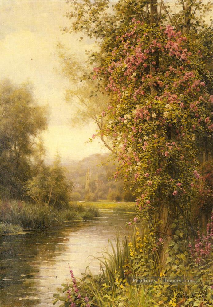 Une vigne en fleurs le long d’un ruisseau sinueux paysage Louis Aston Knight Peintures à l'huile